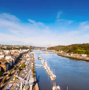 Enjoy stunning river views with marina and lush hills from our hotel, perfect for a relaxing getaway.